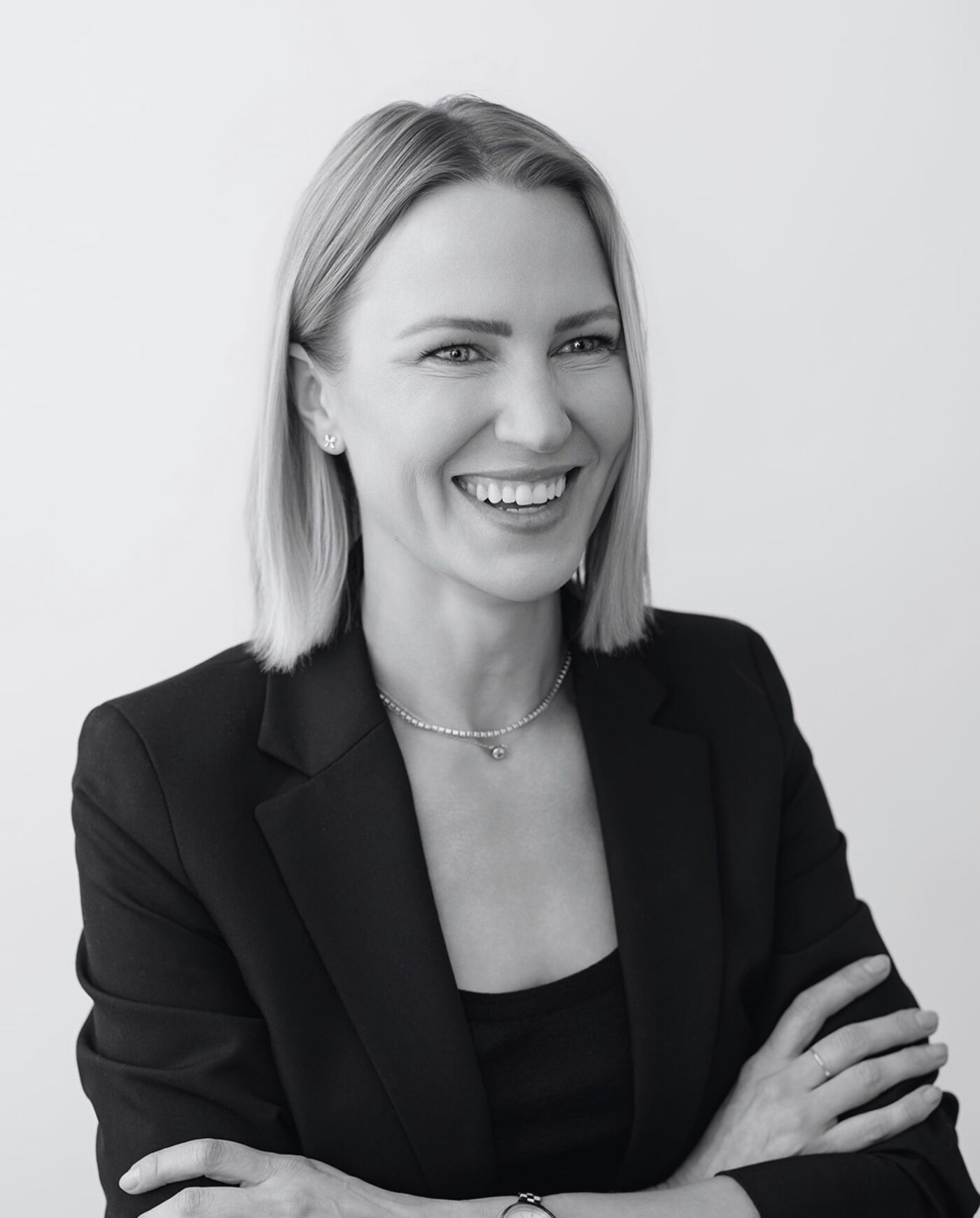 Lindsey Strelecki, RN, BSN, aesthetic nurse injector at Manor Aesthetics & Wellness in Fort Worth, black-and-white portrait